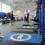 Brighton players training with resistance bands.