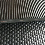 Close-up of ribbed and honeycomb rubber floor mat