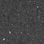 Close-up texture of black recycled rubber flooring with white EPDM flecks