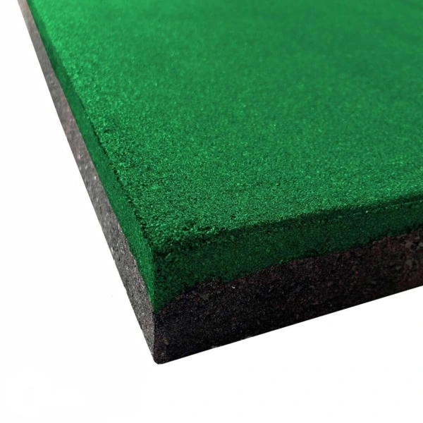 Corner of green top and black base rubber tile