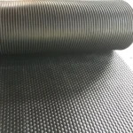 Roll of ribbed rubber matting on honeycomb base