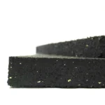 Side profile of a thick, heavy-duty rubber floor mat showing its dense composition