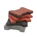 Stack of multi-colored interlocking rubber floor tiles